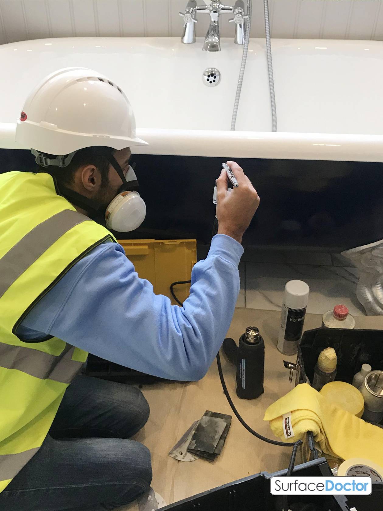 Bath repair Birmingham before and after - Bath Repair Birmingham restoring a damaged Victorian cast iron bath in a Moseley red brick terrace to pristine condition